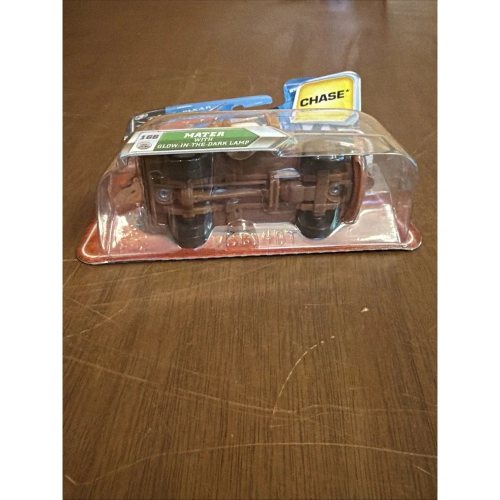 2010 Disney Pixar Cars Chase Mater #166 with Glow-In-The-Dark Lamp New ON CARD